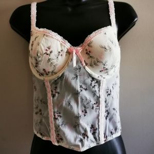 Delicate looking pink floral boostier size XL